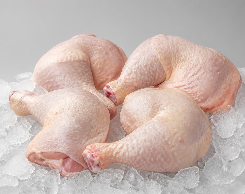 Frozen bone-in hen leg quarters on crushed ice, unbranded product photograph