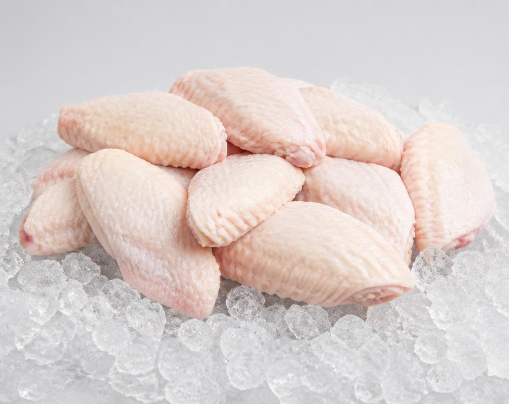 Frozen three-joint hen wings on crushed ice, unbranded product photograph
